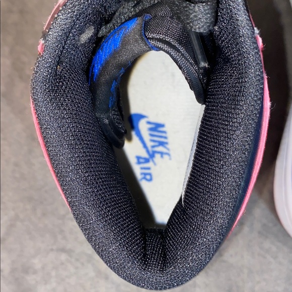 Nike Air Jordan 1 High OG in Red, Black, Blue, and White. - Picture 5 of 10